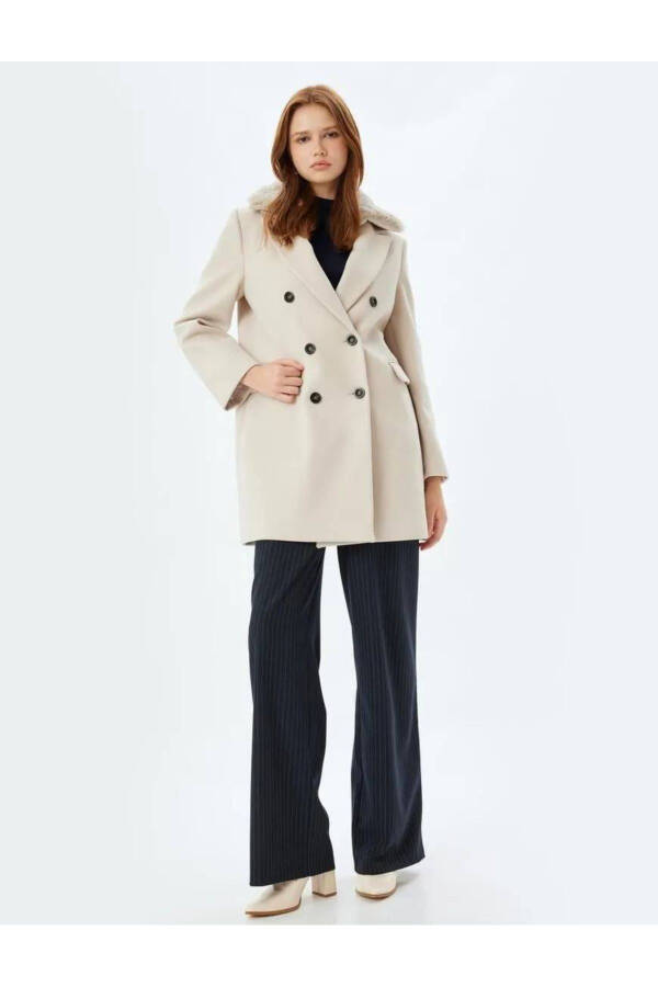 Wool coat with detachable faux fur collar, pockets and buttons. - 22