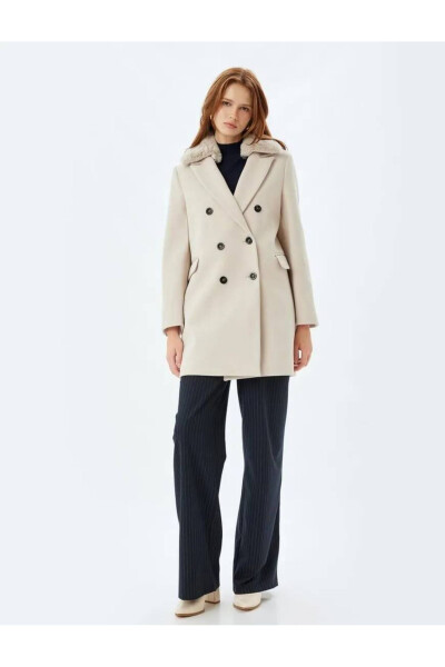 Wool coat with detachable faux fur collar, pockets and buttons. - 24