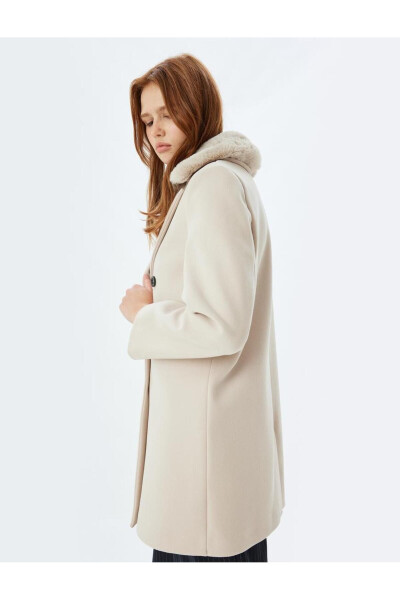 Wool coat with detachable faux fur collar, pockets and buttons. - 18