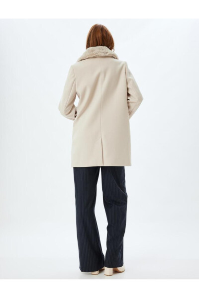 Wool coat with detachable faux fur collar, pockets and buttons. - 20