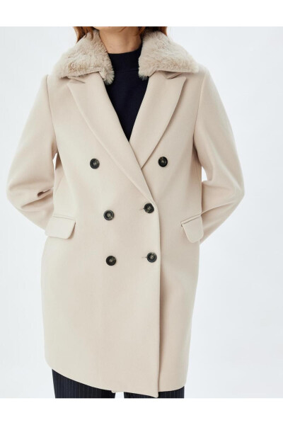 Wool coat with detachable faux fur collar, pockets and buttons. - 21