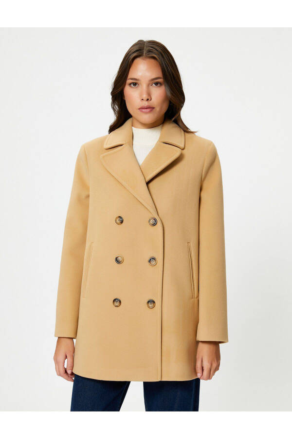 Woolen coat with double-breasted buttons and pocket details - 10