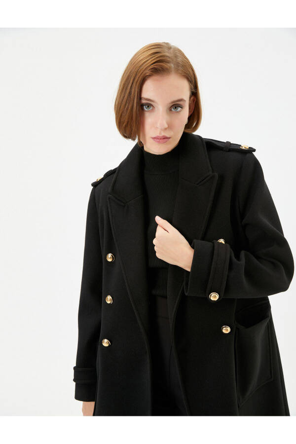 Woolen coat with double breasted closure, pockets and epaulet details. - 2